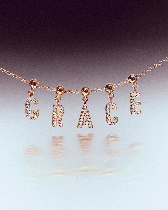 Best necklaces and pendants with emerald gemstones for a rich, sophisticated design-GRID Letter R Charm